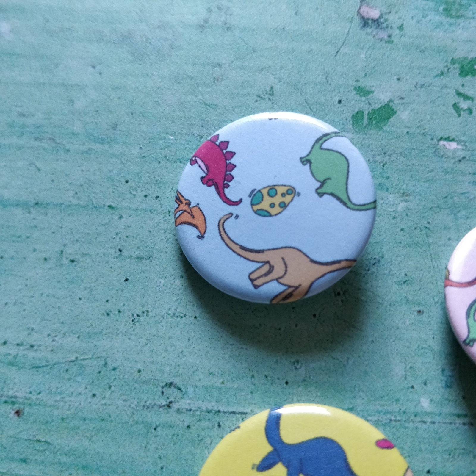 Illustrated Colourful Dinosaurs Badge/Mirror - Fay Dixon Design