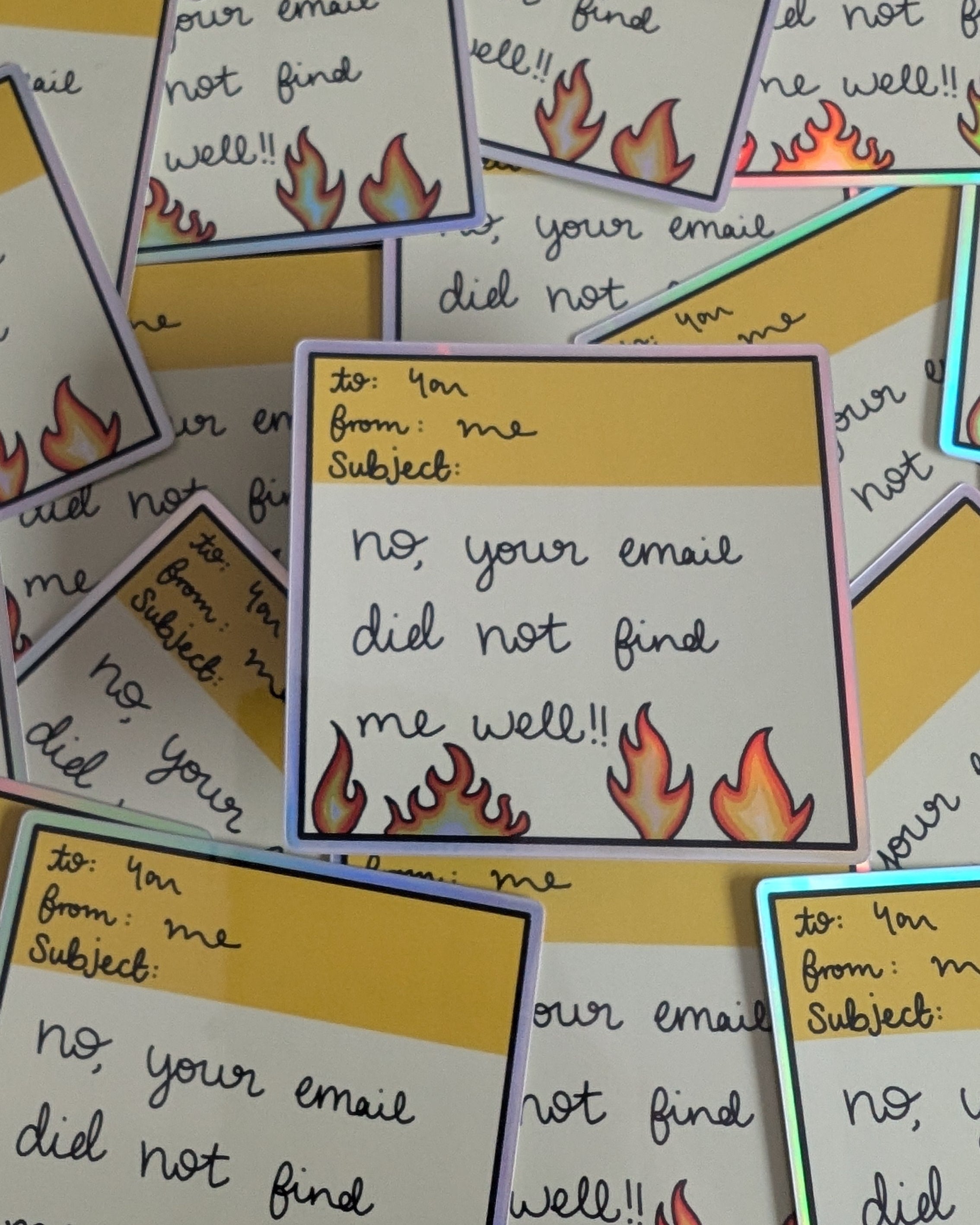Multiple copies of a square sticker with text and fire graphics on a yellow background
